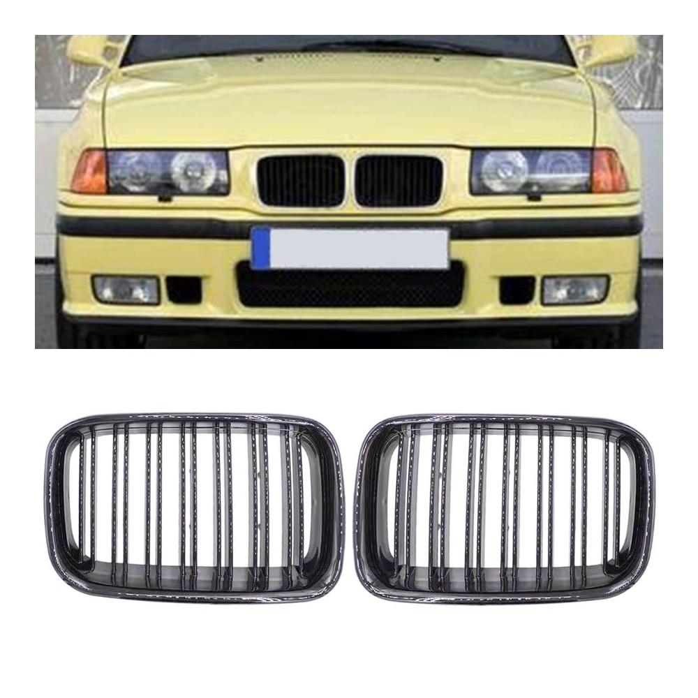 Entdecken Sie Stil und Qualität 2er Set Glänzend Schwarz Front- & Kühlergrille mit Dual Slat Linien für BMW 3er E36 1992-1996. Erneuern Sie den Look Ihres Autos mit diesem hochwertigen Front Hood Grill. Perfekte Passform und zeitloses Design für echte Fahrzeugliebhaber. Upgrade jetzt und verleihen Sie Ihrem BMW einen beeindruckenden Look