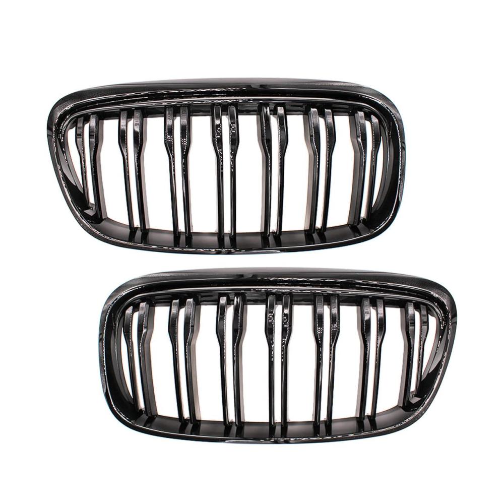 Entdecken Sie Stil und Qualität Hochglanzschwarz Doppellamellen Frontstoßstangengrill-Set für BMW 2er F45 Active Tourer & 2er F46 Gran Tourer Vorfacelift. Verleihen Sie Ihrem Fahrzeug einen einzigartigen Look mit diesen 2-teiligen Frontgrill Mesh. Exklusives Design für BMW-Enthusiasten. Perfekte Passform und einfache Installation. Verbessern Sie die Ästhetik Ihres Fahrzeugs und setzen Sie ein Statement auf der Straße. Hergestellt aus hochwertigem Material für Langlebigkeit und Eleganz. Geben Sie Ihrem BMW den Look den er verdient. Bestellen Sie jetzt und erleben Sie die Fusion von Stil und Funktionalität