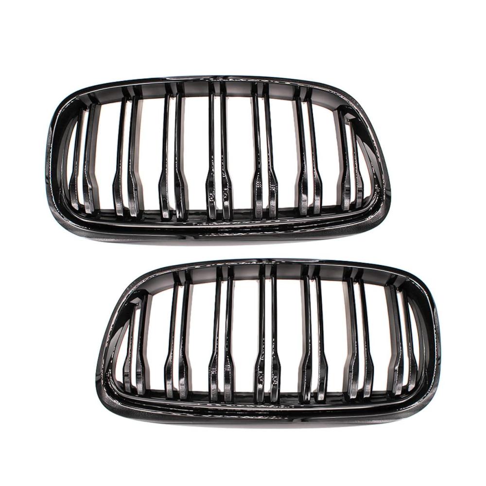 Entdecken Sie Stil und Qualität Hochglanzschwarz Doppellamellen Frontstoßstangengrill-Set für BMW 2er F45 Active Tourer & 2er F46 Gran Tourer Vorfacelift. Verleihen Sie Ihrem Fahrzeug einen einzigartigen Look mit diesen 2-teiligen Frontgrill Mesh. Exklusives Design für BMW-Enthusiasten. Perfekte Passform und einfache Installation. Verbessern Sie die Ästhetik Ihres Fahrzeugs und setzen Sie ein Statement auf der Straße. Hergestellt aus hochwertigem Material für Langlebigkeit und Eleganz. Geben Sie Ihrem BMW den Look den er verdient. Bestellen Sie jetzt und erleben Sie die Fusion von Stil und Funktionalität